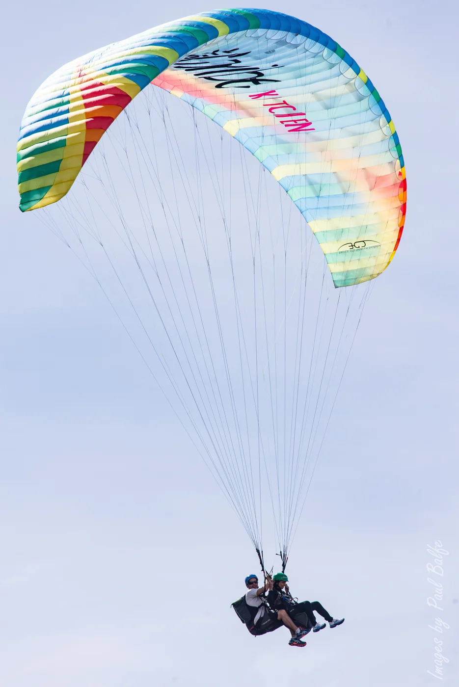 Tandem parachute descending near Queenstown